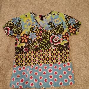 Women's Floral Scrub Top. Drawstring In the back at the waist. Cute & Stylish!
